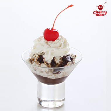 Ice cream sundae with homemade cherry chocolate sauce.