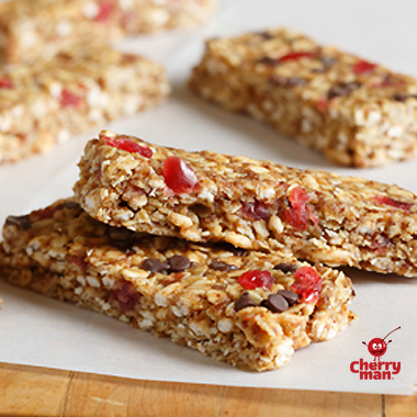 No-bake cherry and chocolate energy (nrg) bars with peanut butter and whole grains.