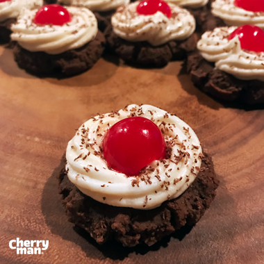 Black Forest cookies with frosting and a cherry on top!
