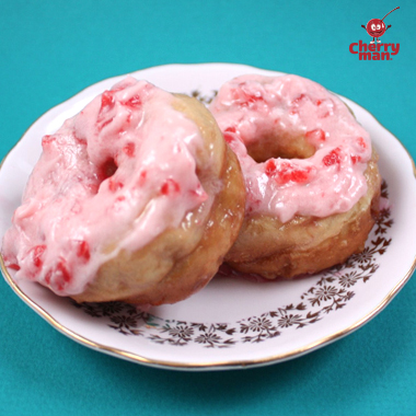 A stack of chocolate cherry cookies served with cold milk. 