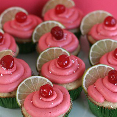 maraschino cherry lime cupcakes with fresh lime slices