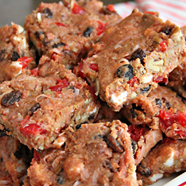 Icebox fruitcake bars with raisins, coconut and cherries.