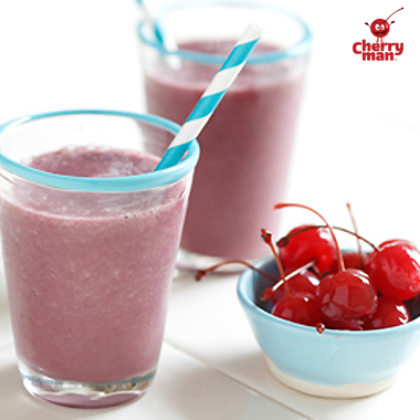 Gluten-free maraschino cherry and vanilla smoothie served with snack size bowl of cherries.