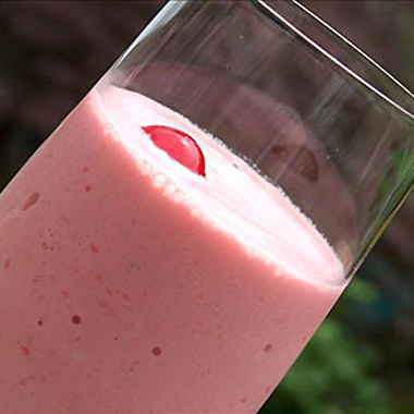 Maraschino cherry milk shake with vanilla ice cream