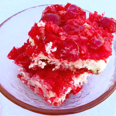 A stack of chocolate cherry cookies served with cold milk. 